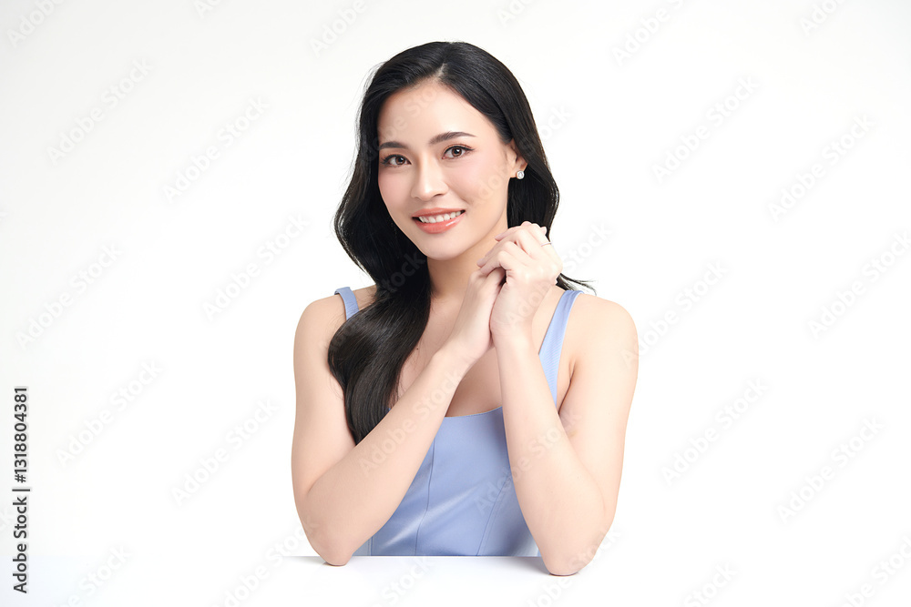 A beautiful young Asian woman with clean, fresh skin against a white background. She represents beauty, skincare, and spa treatments. A beautiful young Asian woman with clean, fresh skin against a white background. She represents beauty, skincare, and spa treatments.
