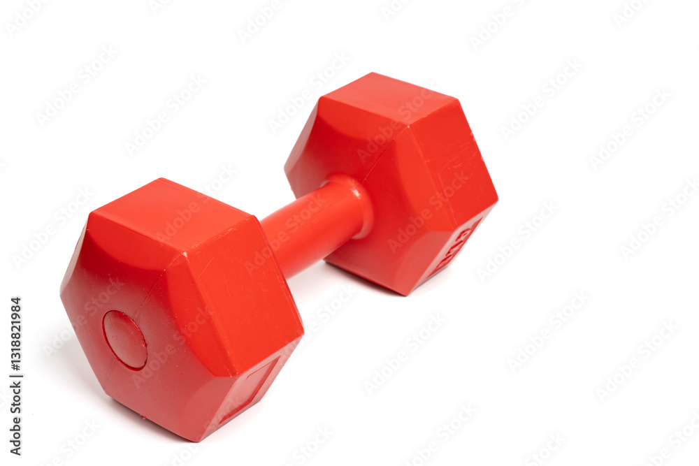 Red hexagonal dumbbell on isolated white background, fitness equipment. Close up of exercise weight dumbbell. Strength, workout, health and exercise concept. Copy space Red hexagonal dumbbell on isolated white background, fitness equipment. Close up of exercise weight dumbbell. Strength, workout, health and exercise concept. Copy space