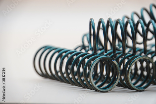 The coil spring for industrial purpose with the lighting effect. photo