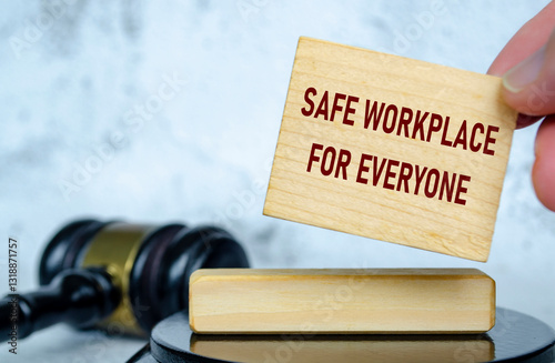 Safe workplace for everyone text written on wooden board with lawyer gavel background