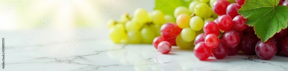 Elegant arrangement of fresh green and red grapes on marble surface, grapes, food, still life Elegant arrangement of fresh green and red grapes on marble surface, grapes, food, still life