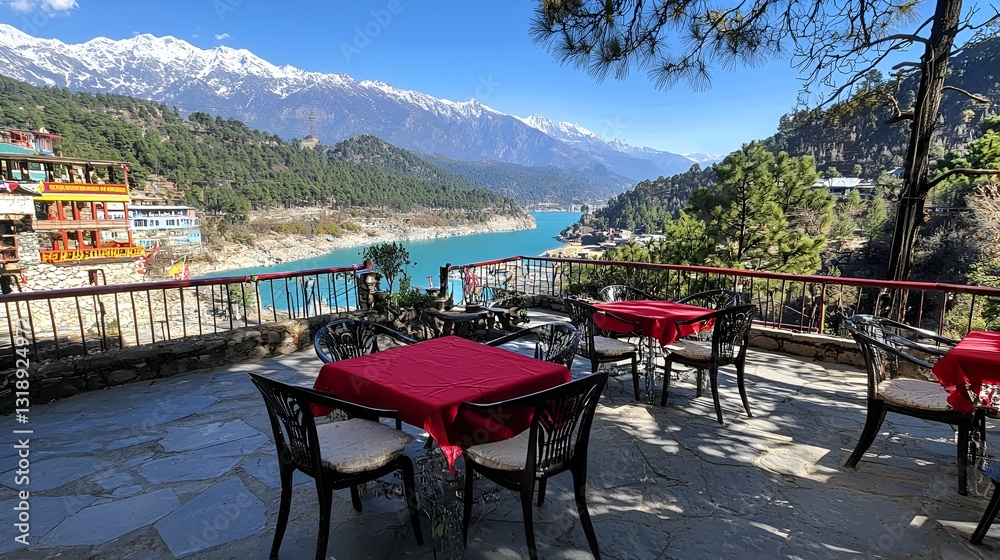 Fototapeta premium Mountain view restaurant terrace, sunny day, colorful village, snow-capped peaks