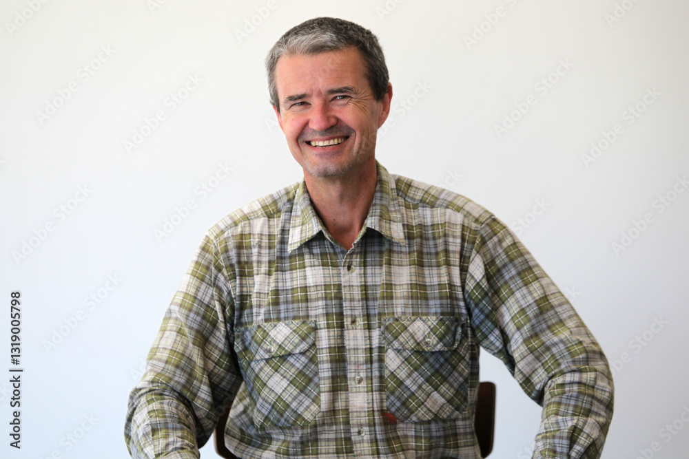 middle-aged man in work clothes middle-aged man in work clothes