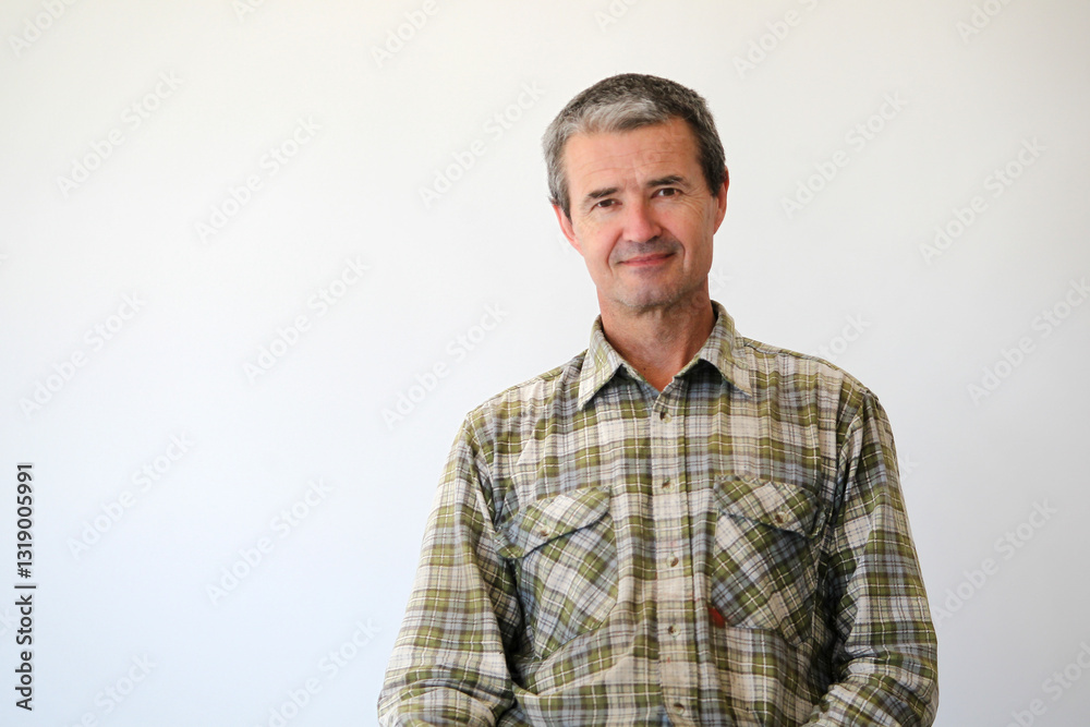 middle-aged man in work clothes middle-aged man in work clothes