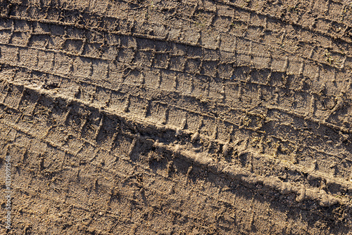 car wheel tracks on wet ground, bad road