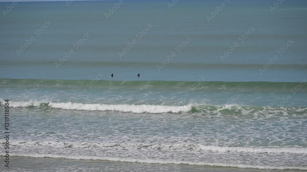 Seaside of Biscarosse and surfers on the waves, west-southern France. High quality 4k footage Seaside of Biscarosse and surfers on the waves, west-southern France. High quality 4k footage