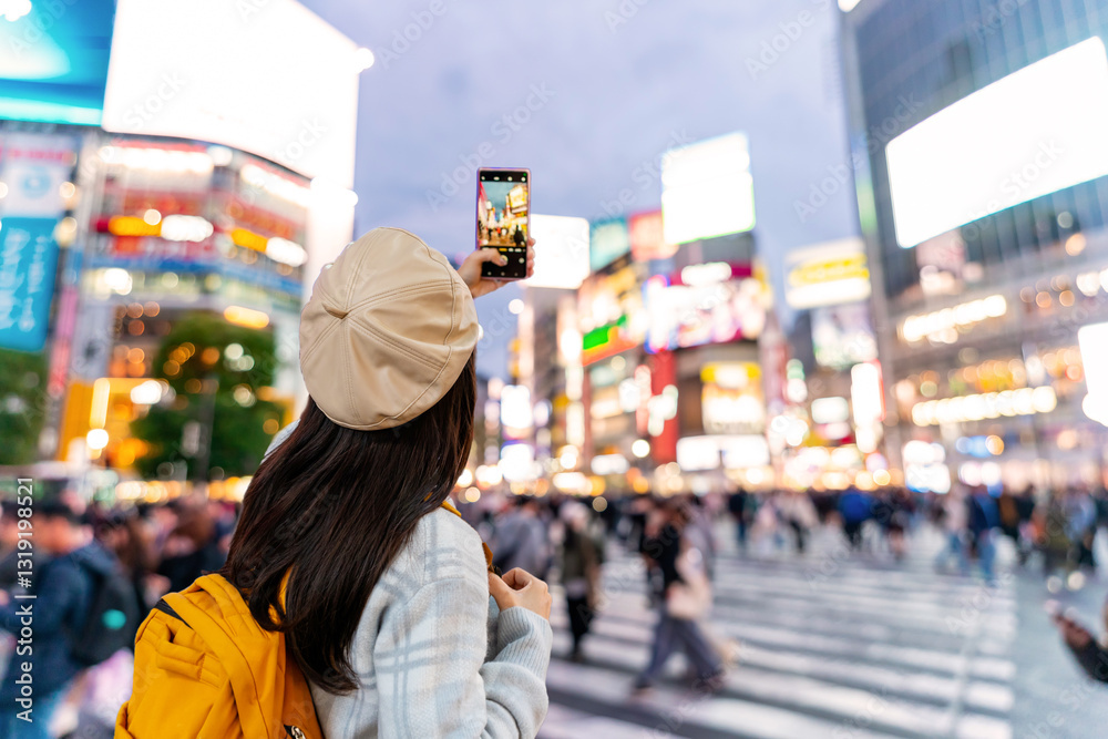 Φωτογραφία Young woman tourist enjoying and shopping at Shibuya crossing the largest and po