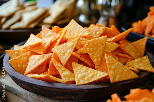 warm potato chip with  cheese powder in a bowl