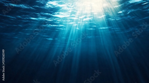 Underwater scene with sunlight beams, deep blue ocean depths illuminating tranquil aquatic environment, perfect for backgrounds.