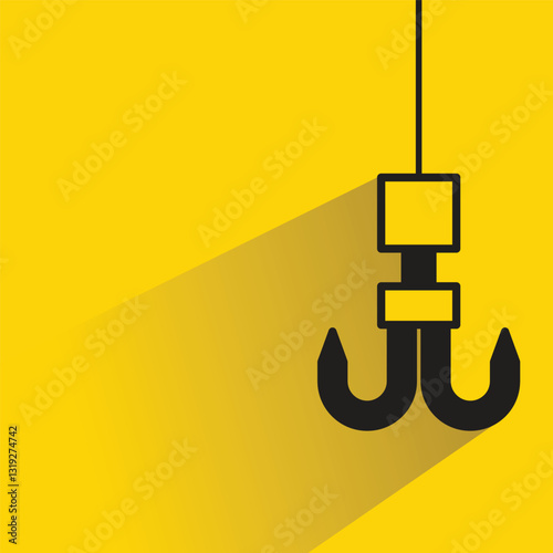 hoist crane hook icon with shadow on yellow background