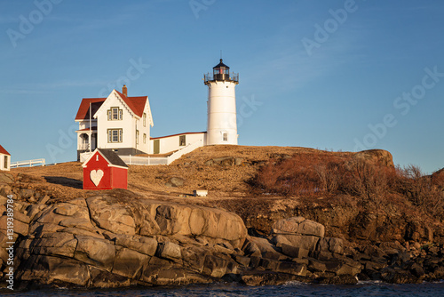 Sunset on Nubble Lighthouse, Maine photo