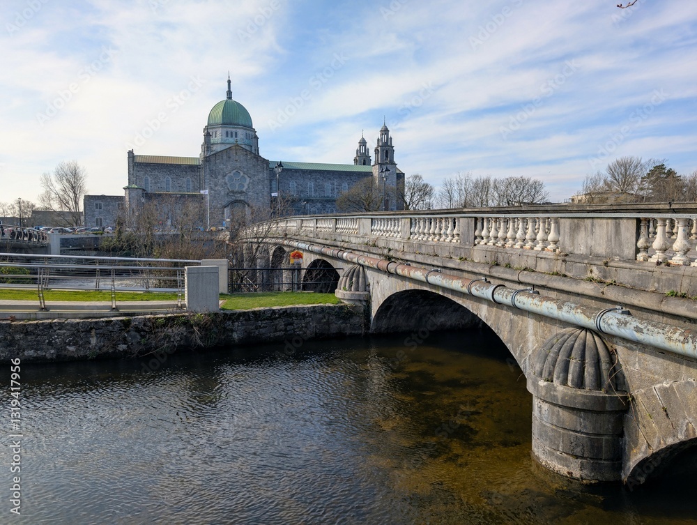 Beautiful scenery, Salmon Weir bridge and Galway cathedral at Galway city, Ireland, buildings and architecture background