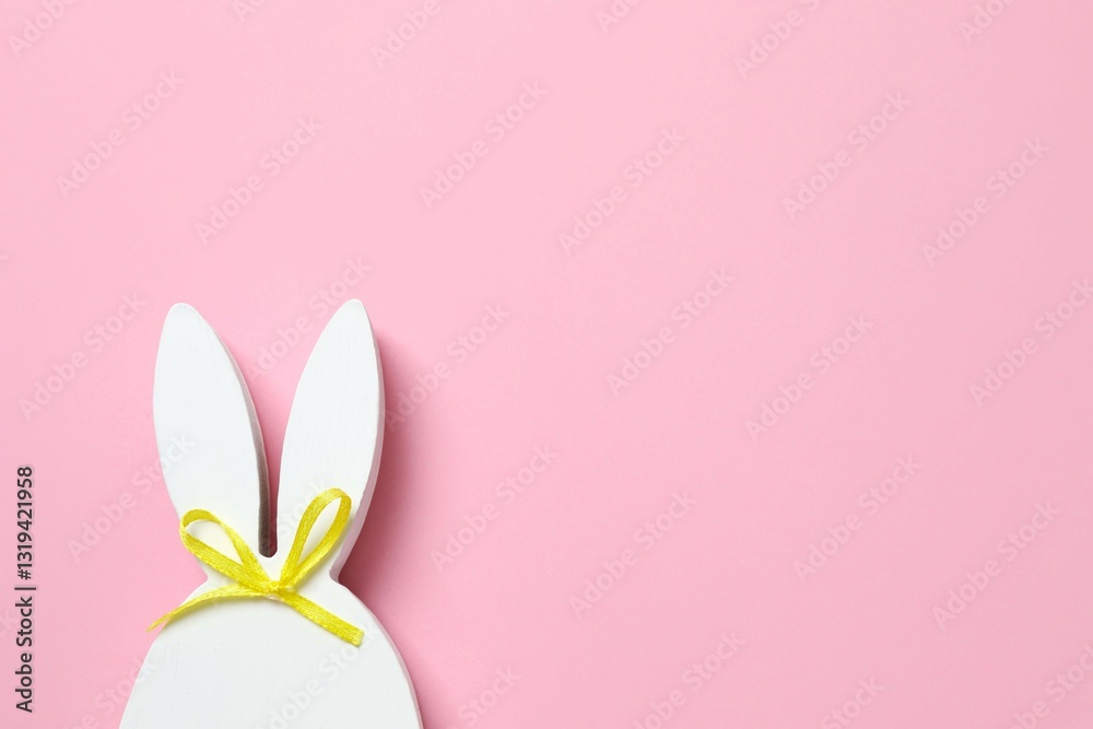 Happy Easter. White bunny ears on color background, space for text or advertising Happy Easter. White bunny ears on color background, space for text or advertising