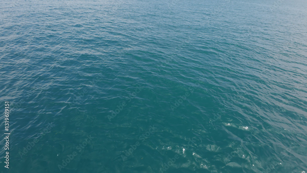 Turquoise Blue Indian ocean waves closeup from boat Turquoise Blue Indian ocean waves closeup from boat