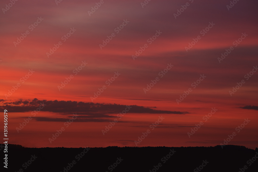 Sunset clouds in the sky in summer evening Sunset clouds in the sky in summer evening