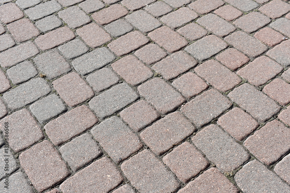 Cobblestone street, criss-cross pattern. Cobblestone street, criss-cross pattern.