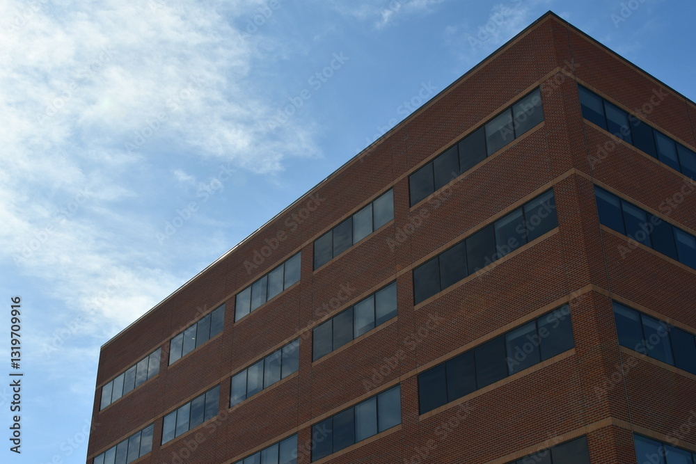 Brick hospital with lots of window. Brick hospital with lots of window.