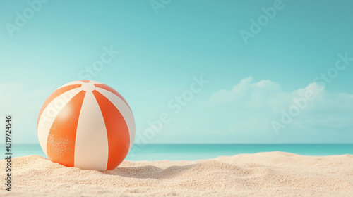 Summer vacation, holiday, travel, tourism, beach , leisure time concept. A serene beach setting with a large, striped beach ball placed on the sand.  Space for text. 