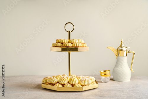 Assorted semolina maamoul or mamoul cookies with dallah. Traditional arabic Eid al Adha, Eid al Fitr sweets	