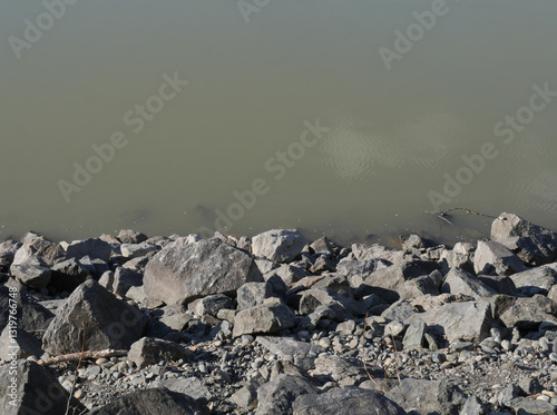 Rocks in the Fraser River at Island 22 Regional Park in Chilliwack, British Columbia, Canada