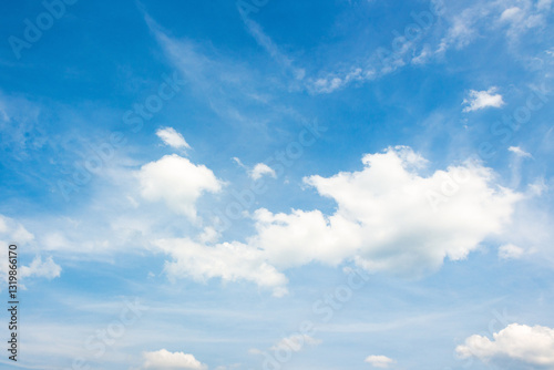 Obraz na płótnie sky with fluffy clouds. holiday windy forecast. white cumulus cloudscape on a blue gradient of atmosphere. sunny summer weather. scenic nature background. meteorology backdrop. fresh air w salonie