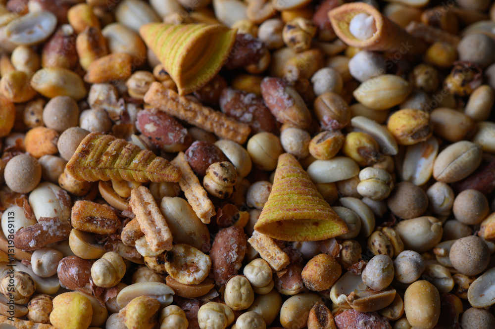 Variety of colorful snacks displayed in a vibrant and lively arrangement on a rustic surface Variety of colorful snacks displayed in a vibrant and lively arrangement on a rustic surface