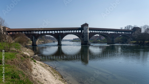 Wallpaper Mural Pavia, Italy. Amazing view of the Ponte Coperto (Covered Bridge) or the Ponte Vecchio (Old Bridge) over the Ticino river Torontodigital.ca