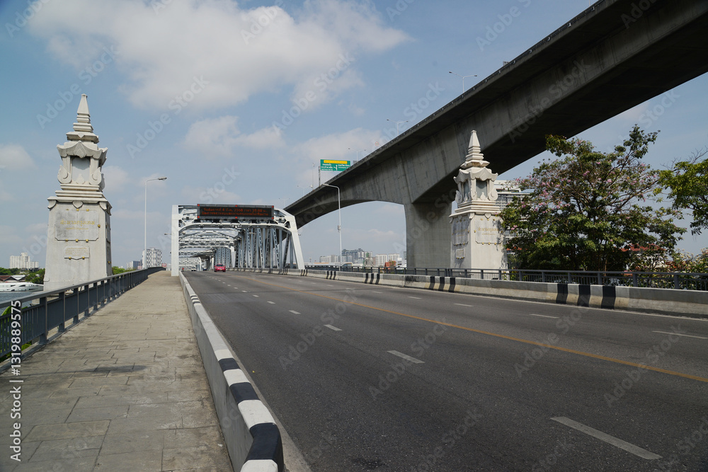 Fototapeta premium Bangkok Bridge and Rama III bridge on top is a bridge across the Chao Phraya River and is the only swing bridge in Southeast Asia that can still be opened and closed.Located at Bangkok city, Thailand.
