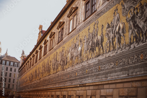 The Fürstenzug in Dresden, Germany, is a large mural of a mounted procession depicting the rulers of Saxony, painted between 1871-1876 to celebrate the Wettin Dynasty's 800th anniversary.

 photo