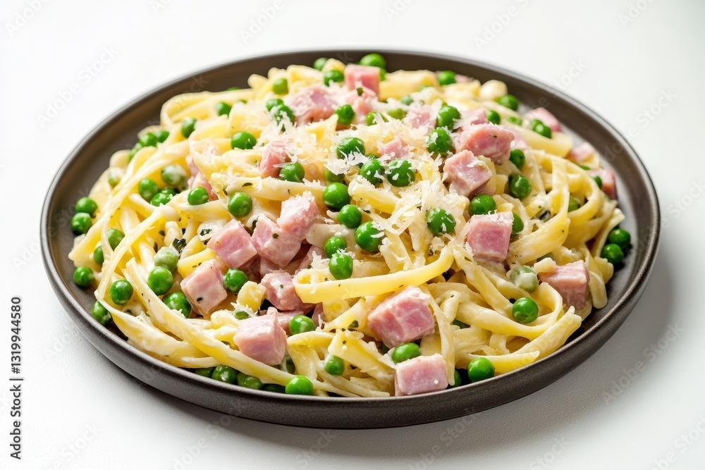 Delicious pasta salad with peas and ham served on a plate for a summer meal Delicious pasta salad with peas and ham served on a plate for a summer meal