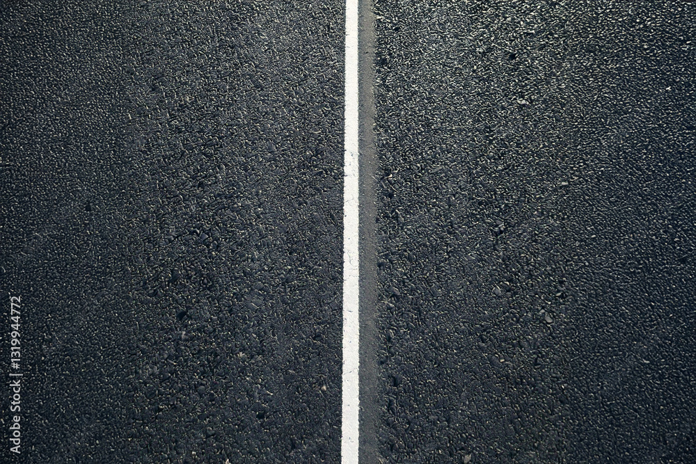 asphalt road with a white line