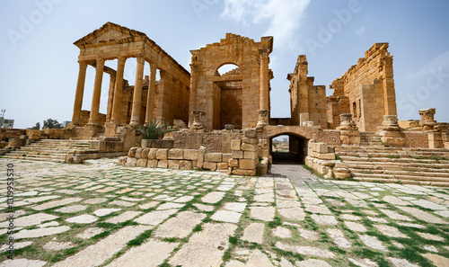 View of historical Capitoline Temples in archeological site of Sbeitla, Tunisia photo