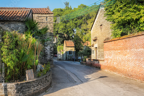 Foshan city, Guangdong, China. Nanhai Shishan Huangxi Village with a history of 800 years preserves various types of ancient buildings in Lingnan style, traditional wood and brick carving. photo