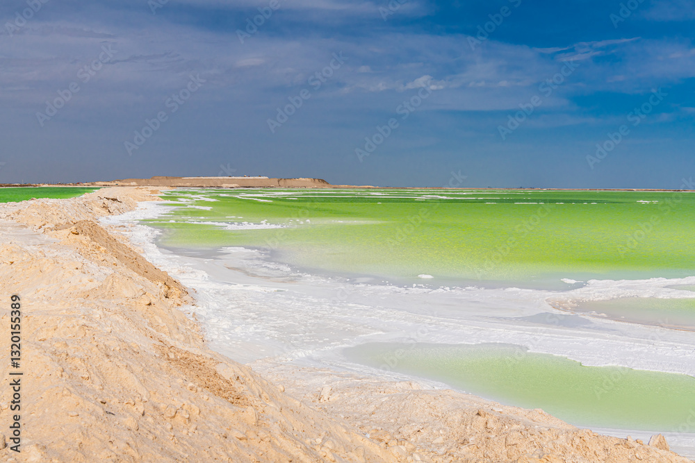 Fototapeta premium Salt and emerald water of Qarhan or Chaerhan lake around Golmud city, Qinghai, China