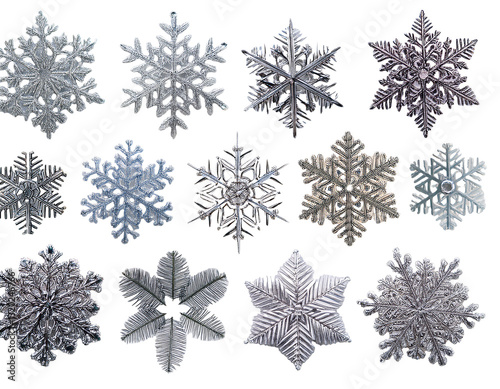 A collection of snowflakes in different shapes, isolated on white background