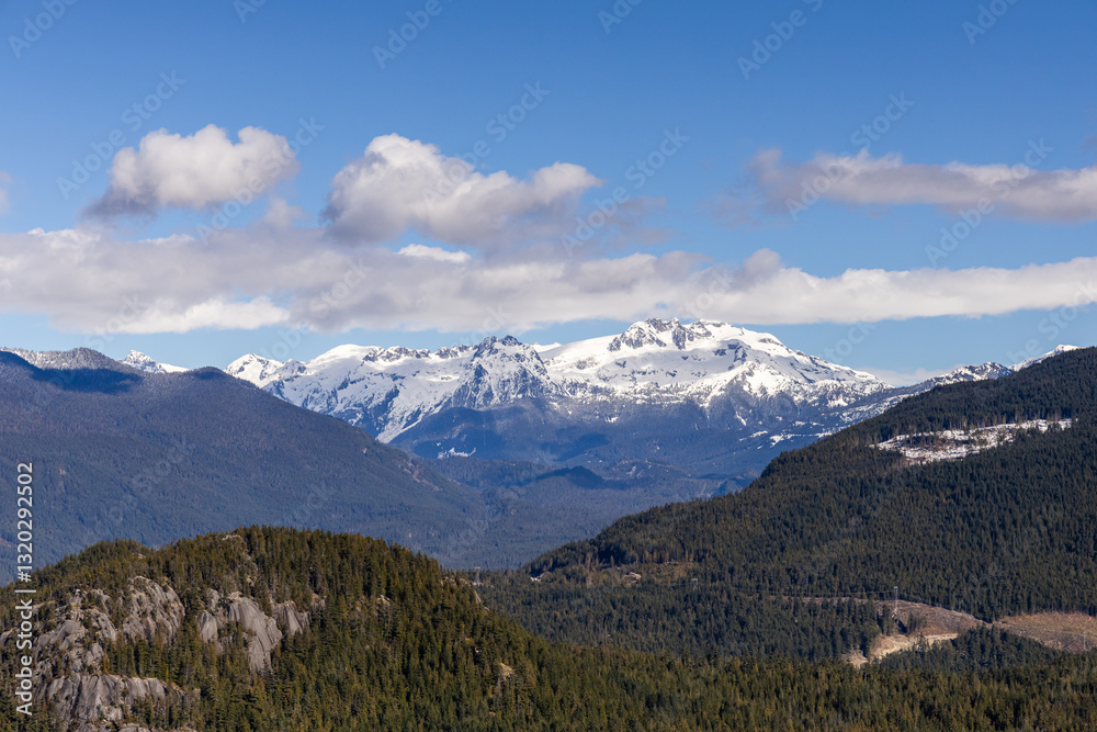 Snow-Capped Chief Mountain and Forest Landscape in Squamish, British Columbia, Canada Snow-Capped Chief Mountain and Forest Landscape in Squamish, British Columbia, Canada