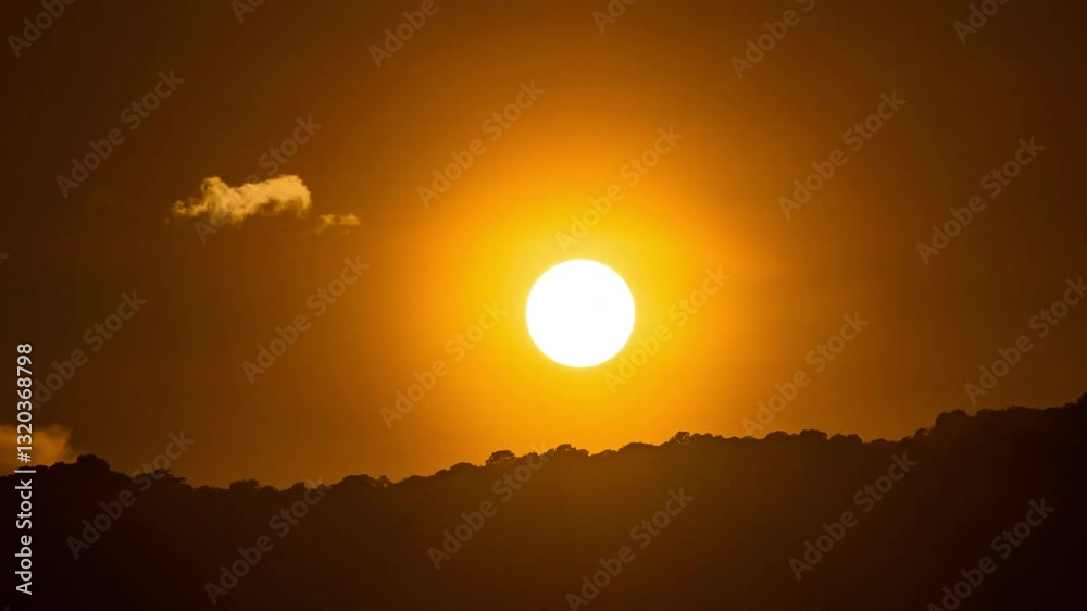 Timelapse of dramatic sunset with orange sky in a cloudy day. Timelapse of dramatic sunset with orange sky in a cloudy day.