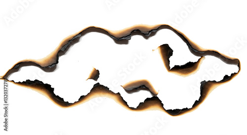 Collection of burnt holes in piece of paper isolated on white background