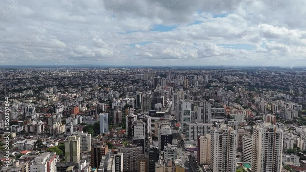 A aerial view of Curitiba with the drone moving forward, offering an engaging perspective of the city’s urban landscape. A aerial view of Curitiba with the drone moving forward, offering an engaging perspective of the city’s urban landscape.