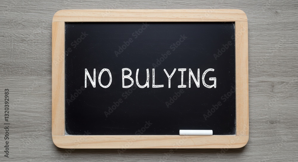 A black board displaying the message stop bullying A black board displaying the message stop bullying