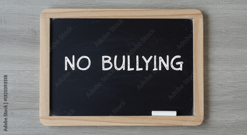 A black board displaying the message stop bullying A black board displaying the message stop bullying