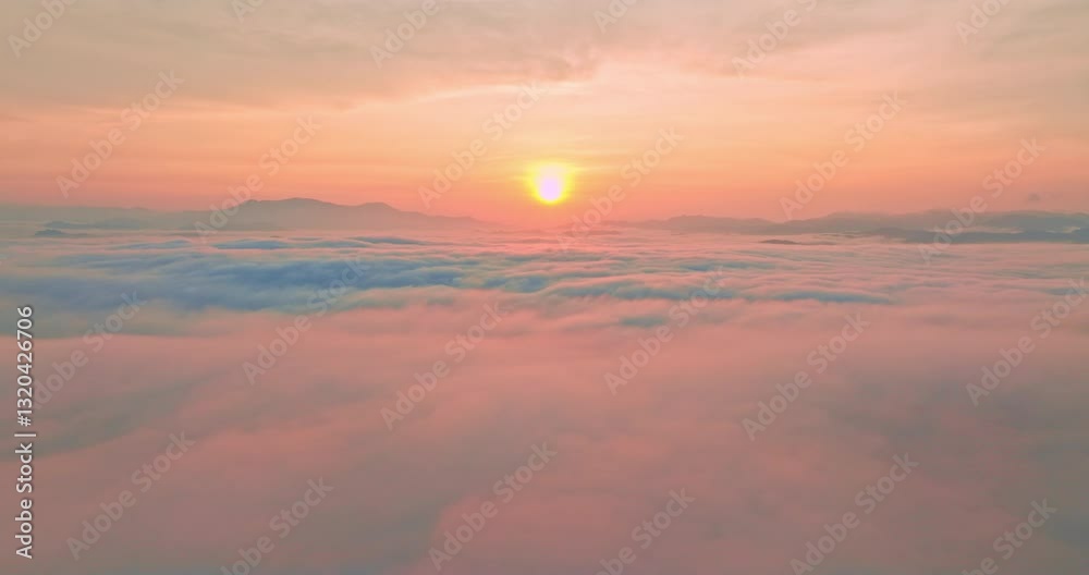Aerial view A breathtaking view of dawn breaking over a misty mountain landscape, with layers of fog and vibrant colors painting the horizon. The serene atmosphere and natural beauty Aerial view A breathtaking view of dawn breaking over a misty mountain landscape, with layers of fog and vibrant colors painting the horizon. The serene atmosphere and natural beauty