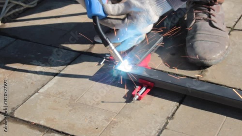 repair work with metal using a welding machine 