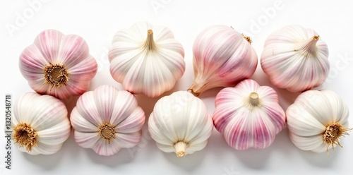 Fresh garlic bulbs arranged neatly on white background, spice, cooking