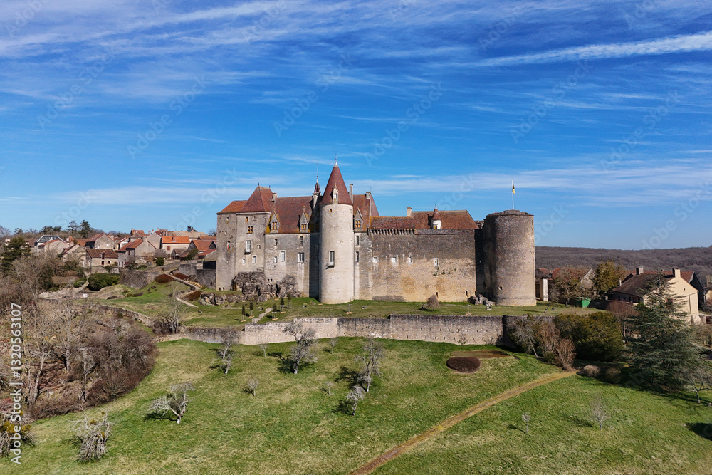 Medieval castle in the village of Châteauneuf in Burgundy, France Medieval castle in the village of Châteauneuf in Burgundy, France