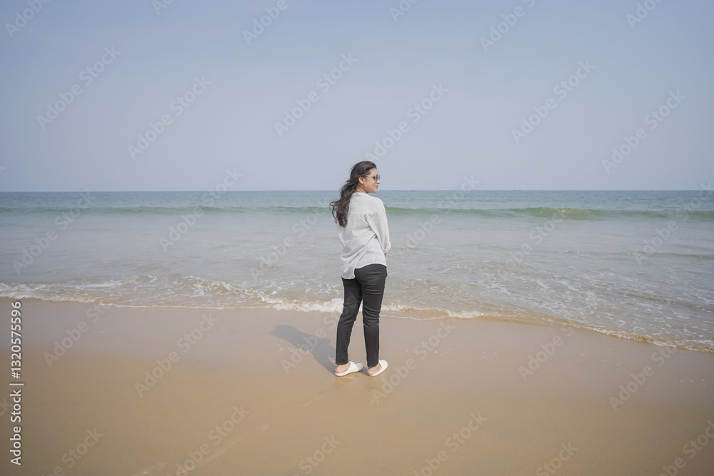 Beachside bliss, Woman by the sea, Ocean breeze moment, Coastal serenity, Sand and waves, Peaceful beach stroll, Nature’s calm stock photo.
Beachside bliss, Woman by the sea, Ocean breeze moment, Coastal serenity, Sand and waves, Peaceful beach stroll, Nature’s calm stock photo.