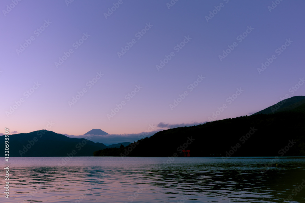 Mt. Fuji and red Torii gate on lake Ashi at Sunset, Hakone, Japan Mt. Fuji and red Torii gate on lake Ashi at Sunset, Hakone, Japan