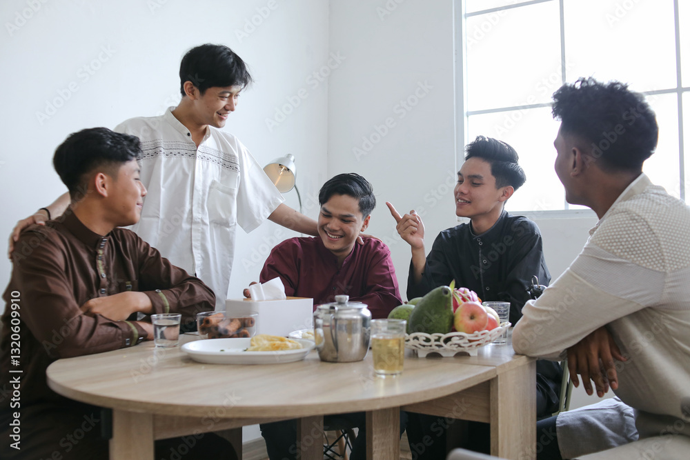 Multiethnic Muslim Friends Break Fasting Together on Iftar Time During Ramadan at Dining Table