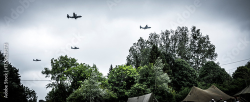 Second world war commemoration at SAINTE MERE L'EGLISE In Normandy, FRANCE. Military planes in camp reconstitution