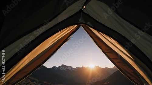 Sunrise over mountain peaks viewed from tent: immersive outdoor camping experience photo
